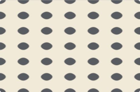 Dark halftone spots on a warm paper color